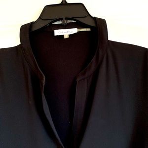 Calvin Klein Tunic, XL size.Black & white on arms.